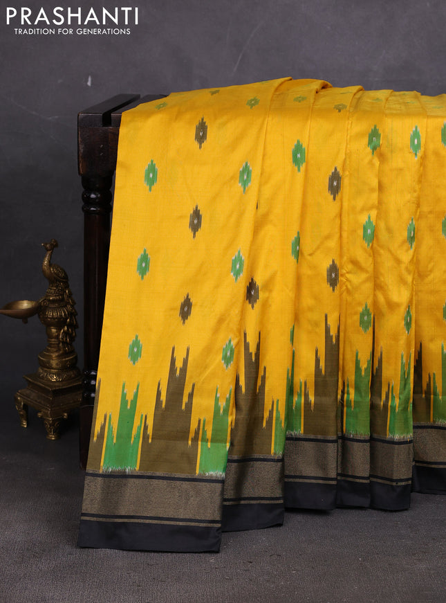 Pochampally silk saree yellow and black with allover ikat woven buttas and long ikat zari woven border