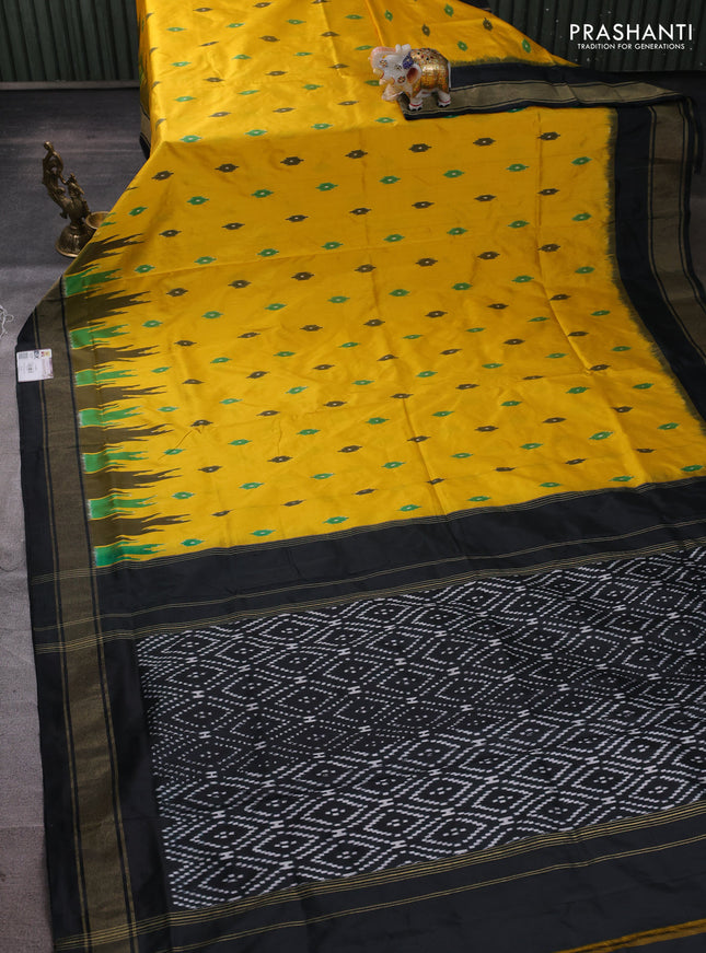 Pochampally silk saree yellow and black with allover ikat woven buttas and long ikat zari woven border