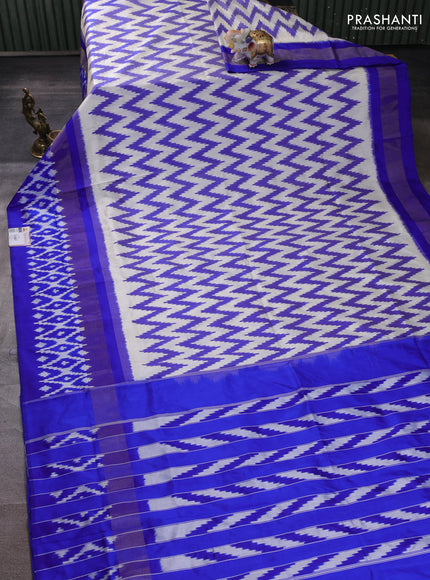 Pochampally silk saree off white and blue with allover ikat weaves and long ikat zari woven border
