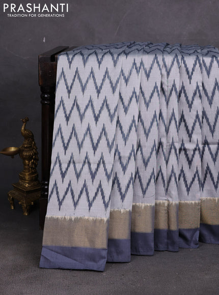 Pochampally silk saree grey with allover ikae weaves and ikat zari wovn border