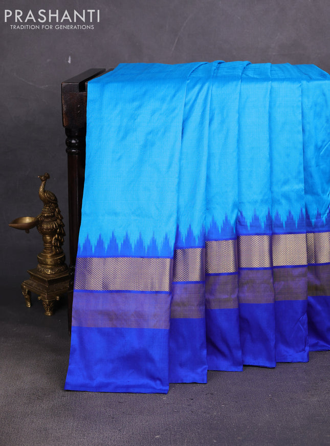 Pochampally silk saree teal blue and blue with plain body and ikat zari wovn border