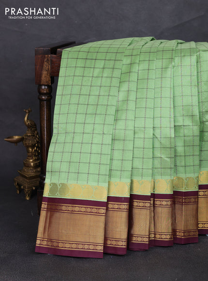 Silk cotton saree pista green and deep maroon with allover checked pattern and zari woven korvai border