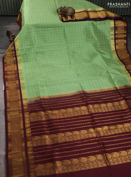 Silk cotton saree pista green and deep maroon with allover checked pattern and zari woven korvai border
