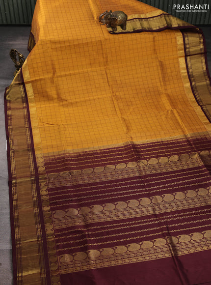 Silk cotton saree mustard yellow and coffee brown with allover checked pattern and zari woven korvai border