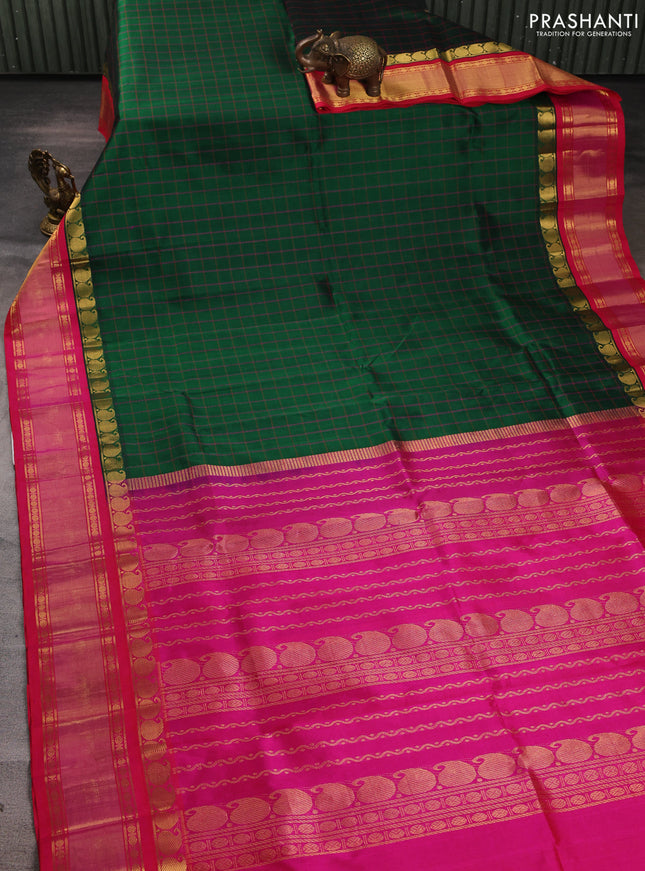 Silk cotton saree green and pink with allover checked pattern and zari woven korvai border