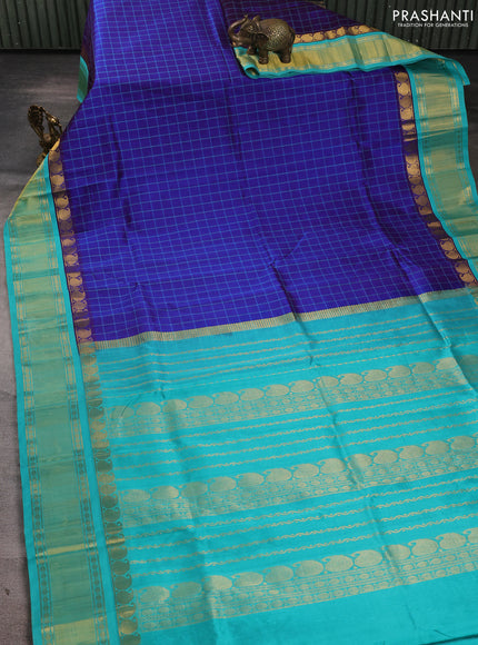 Silk cotton saree royal blue and teal blue with allover checked pattern and zari woven korvai border