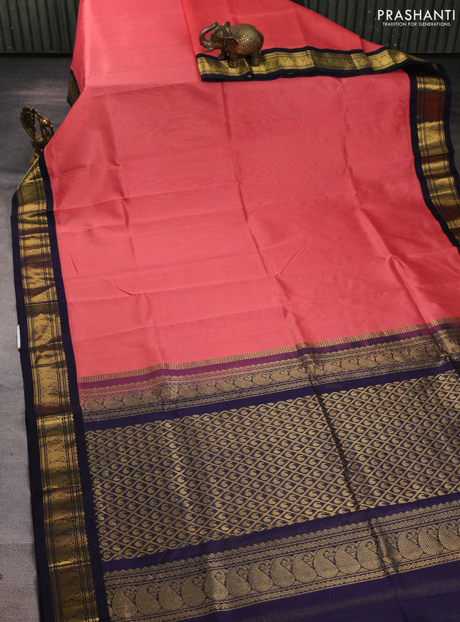 Silk cotton saree peach orange and navy blue with allover zari vairaosi pattern and zari woven korvai border