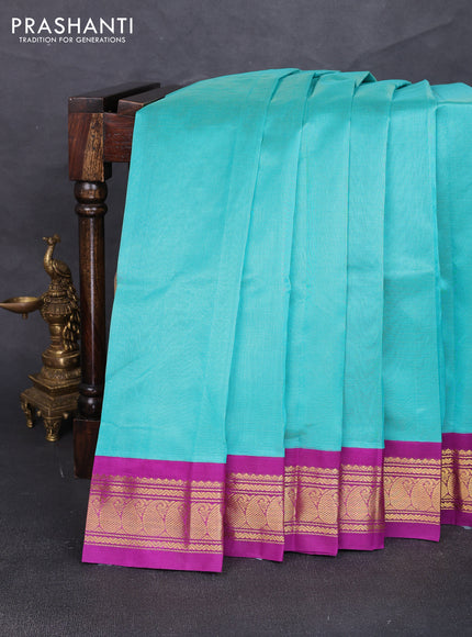 Silk cotton saree teal blue and purple with allover zari vairaosi pattern and zari woven korvai border