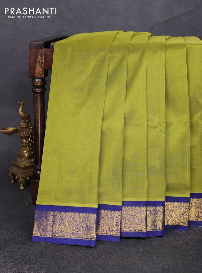 Silk cotton saree mehendi green and blue with plain body and zari woven korvai border