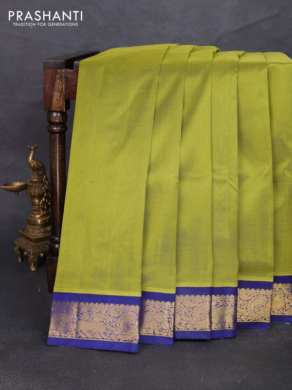Silk cotton saree mehendi green and blue with plain body and zari woven korvai border