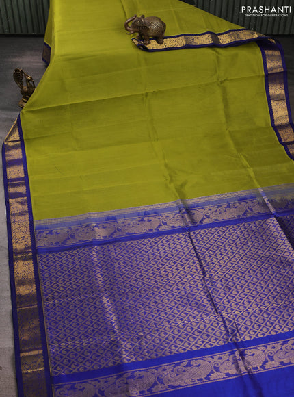 Silk cotton saree mehendi green and blue with plain body and zari woven korvai border