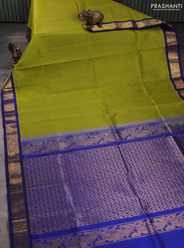 Silk cotton saree mehendi green and blue with plain body and zari woven korvai border