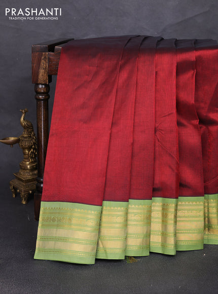 Silk cotton saree maroon and light green with plain body and zari woven korvai border