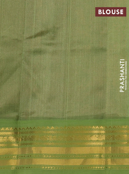 Silk cotton saree maroon and light green with plain body and zari woven korvai border