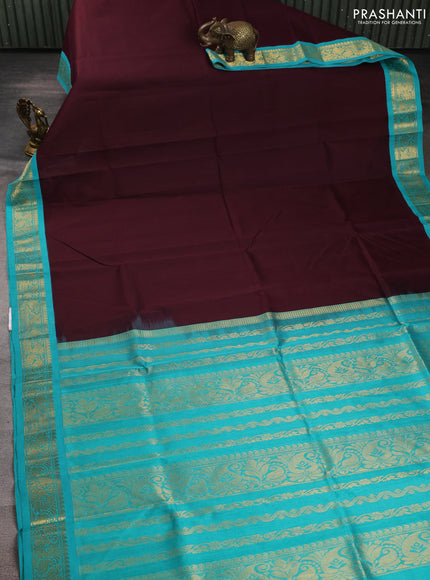 Silk cotton saree coffee brown and teal blue with plain body and zari woven korvai border
