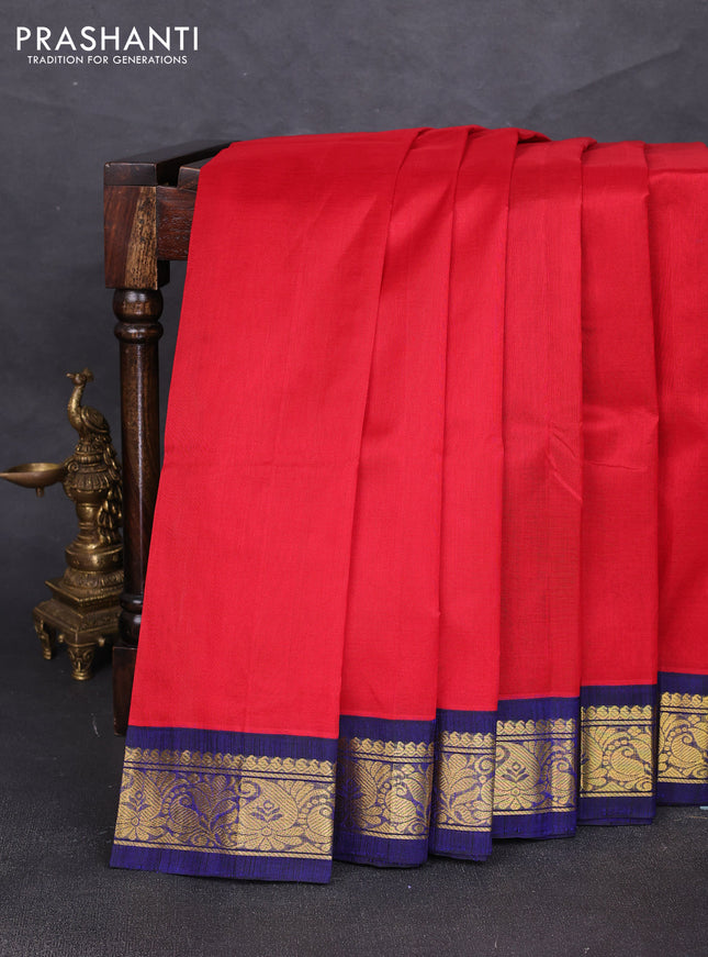 Silk cotton saree red and navy blue with plain body and zari woven korvai border