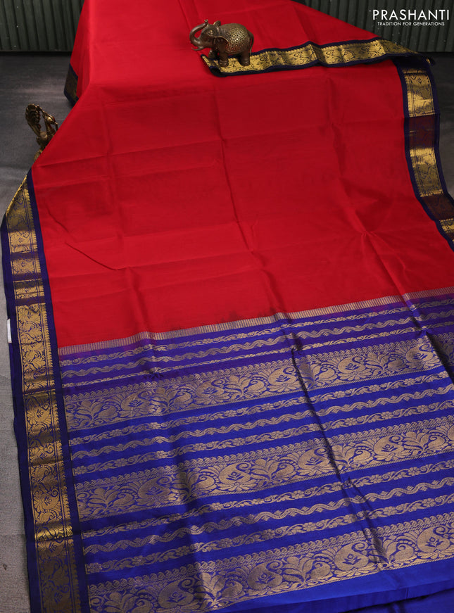 Silk cotton saree red and navy blue with plain body and zari woven korvai border