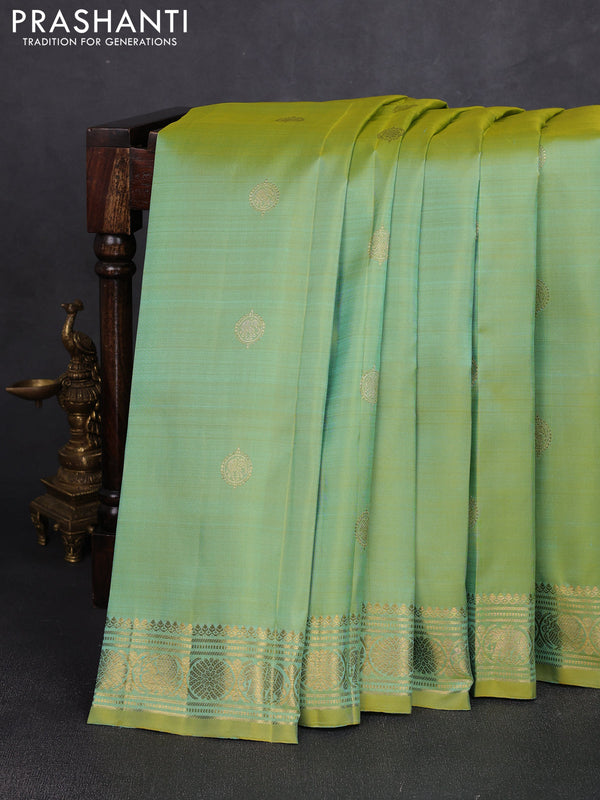 Pure kanchipuram silk saree dual shade of teal green and witrh zari woven buttas and zari woven buttas