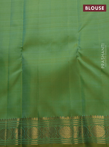 Pure kanchipuram silk saree dual shade of teal green and witrh zari woven buttas and zari woven buttas