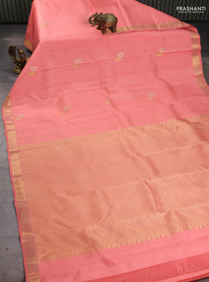 Pure kanchipuram silk saree peach orange with silver & zari woven buttas and temple design zari woven border