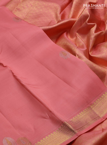 Pure kanchipuram silk saree peach orange with silver & zari woven buttas and temple design zari woven border