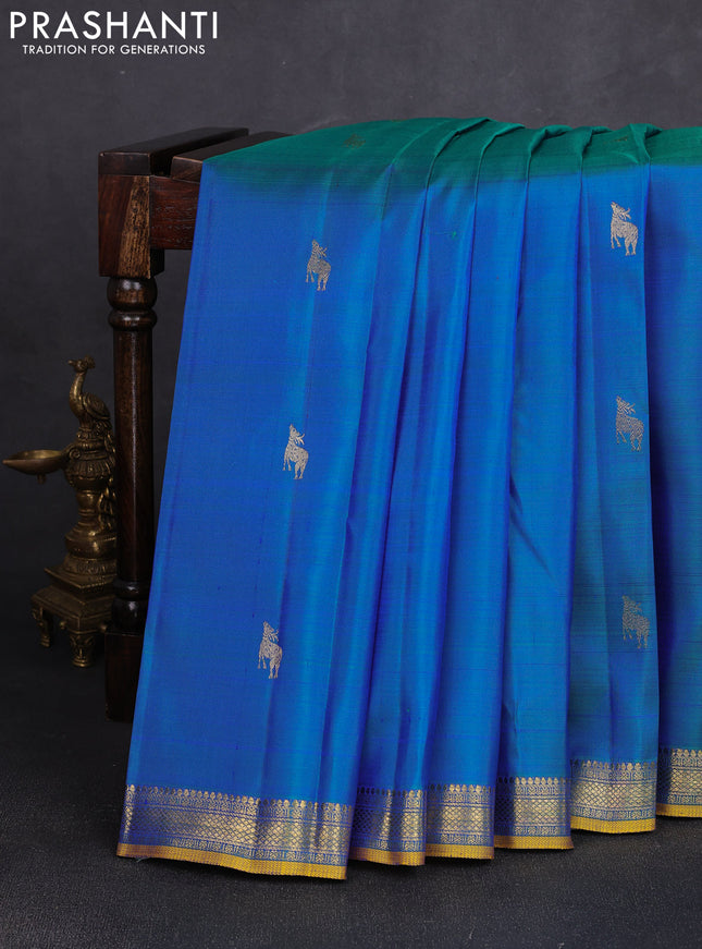 Pure kanchipuram silk saree dual shade of bluish green with zari woven buttas and small zari woven border