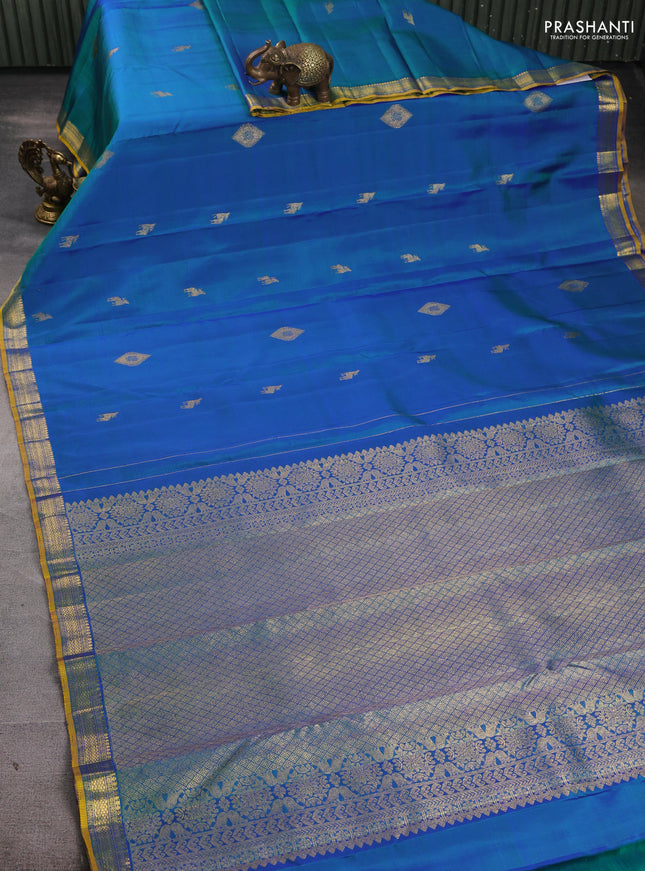 Pure kanchipuram silk saree dual shade of bluish green with zari woven buttas and small zari woven border