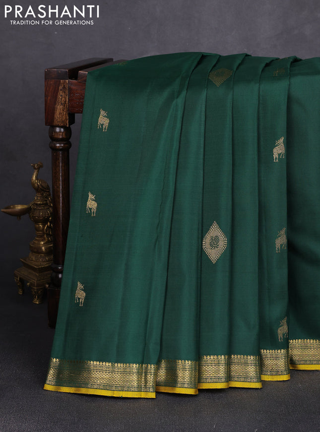 Pure kanchipuram silk saree dark green with zari woven buttas and small zari woven border