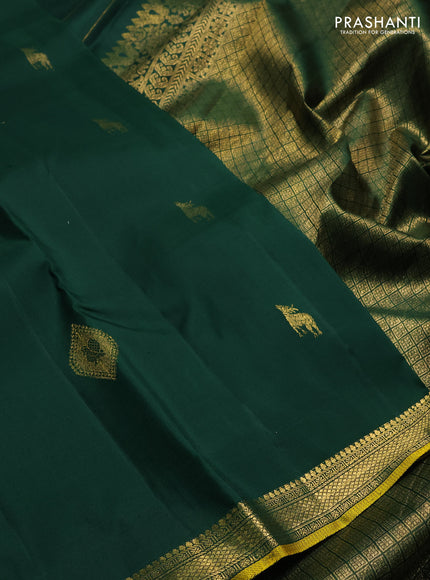 Pure kanchipuram silk saree dark green with zari woven buttas and small zari woven border