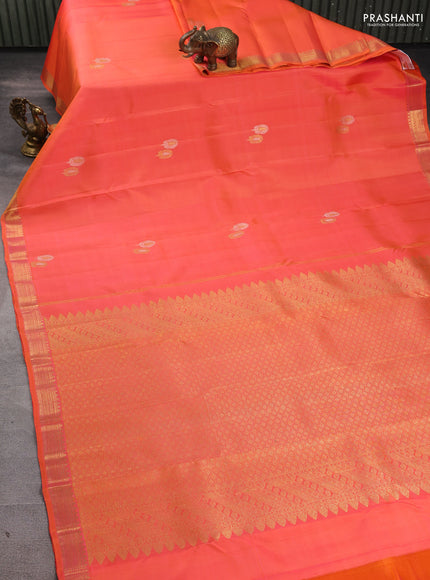 Pure kanchipuram silk saree dual shade of orange with zari woven buttas and small zari woven border