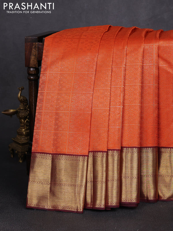 Pure kanchipuram silk saree orange and deep maroon with allover zari woven brocade weaves and rich zari woven korvai border