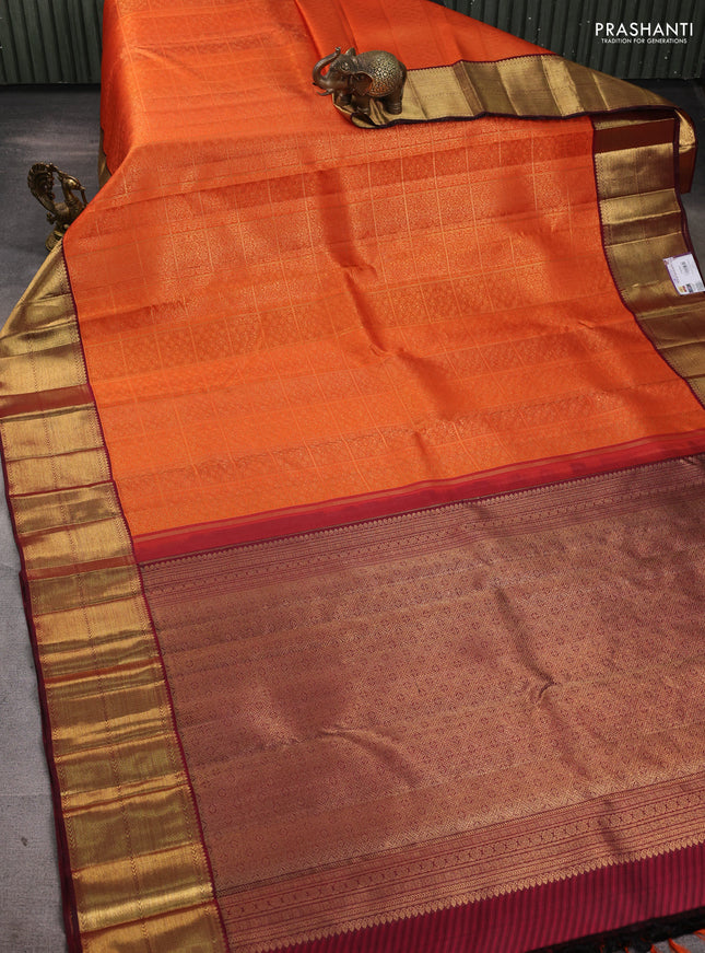 Pure kanchipuram silk saree orange and deep maroon with allover zari woven brocade weaves and rich zari woven korvai border