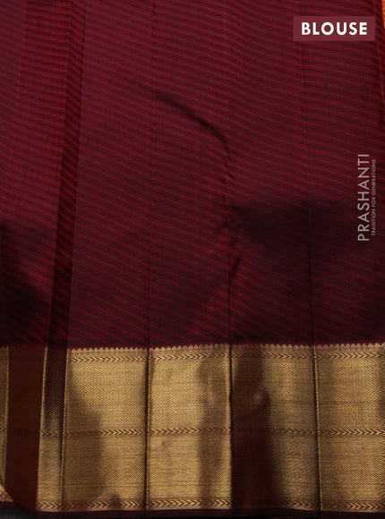 Pure kanchipuram silk saree orange and deep maroon with allover zari woven brocade weaves and rich zari woven korvai border