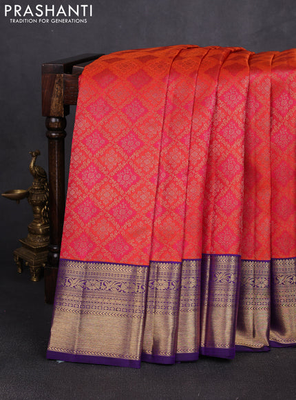 Pure kanchipuram silk saree orange and violet with allover zari woven brocade weaves and rich zari woven korvai border