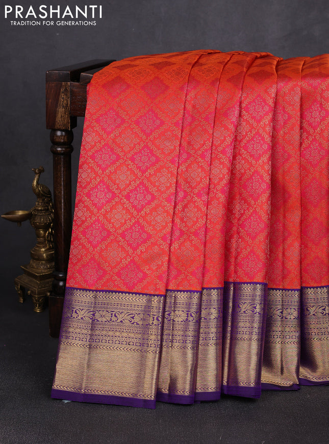 Pure kanchipuram silk saree orange and violet with allover zari woven brocade weaves and rich zari woven korvai border