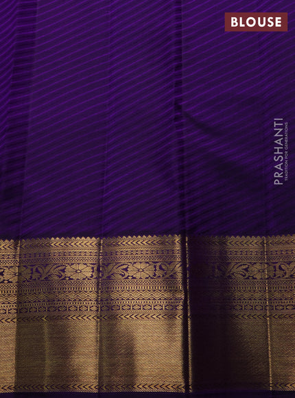 Pure kanchipuram silk saree orange and violet with allover zari woven brocade weaves and rich zari woven korvai border
