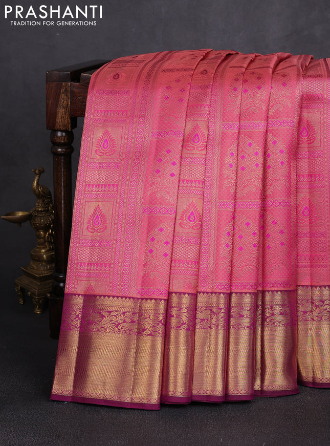 Pure kanchipuram silk saree peach pink and purple with allover zari woven brocade weaves and rich zari woven border