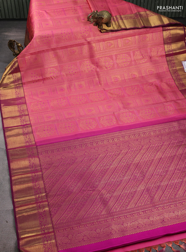 Pure kanchipuram silk saree peach pink and purple with allover zari woven brocade weaves and rich zari woven border