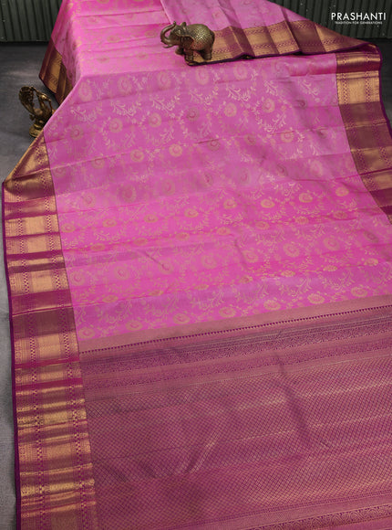 Pure kanchipuram silk saree light pink and purple with allover zari woven brocade weaves and rich zari woven border