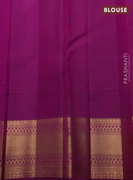 Pure kanchipuram silk saree light pink and purple with allover zari woven brocade weaves and rich zari woven border