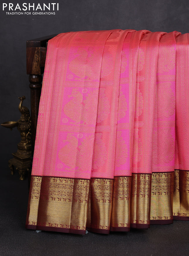 Pure kanchipuram silk saree baby pink and maroon with allover zari woven brocade weaves and zari woven korvai border