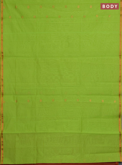 Semi maheswari cotton saree lime green and rust with copper zari woven buttas and small copper zari woven border