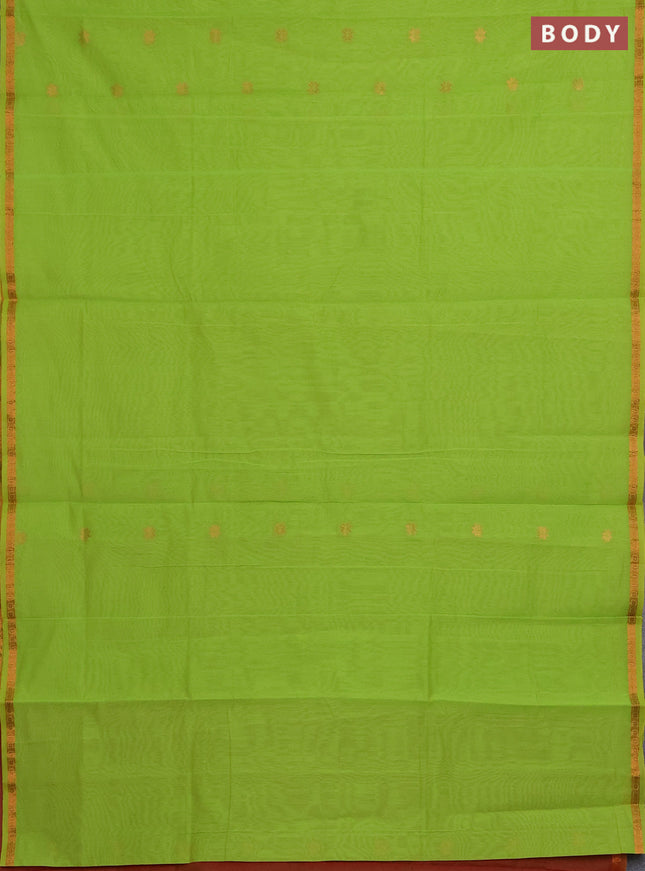 Semi maheswari cotton saree lime green and rust with copper zari woven buttas and small copper zari woven border
