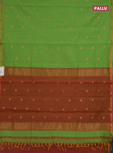Semi maheswari cotton saree lime green and rust with copper zari woven buttas and small copper zari woven border
