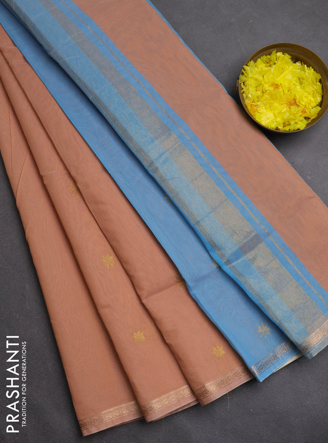 Semi maheswari cotton saree peach shade and teal blue with zari woven buttas and small zari woven border