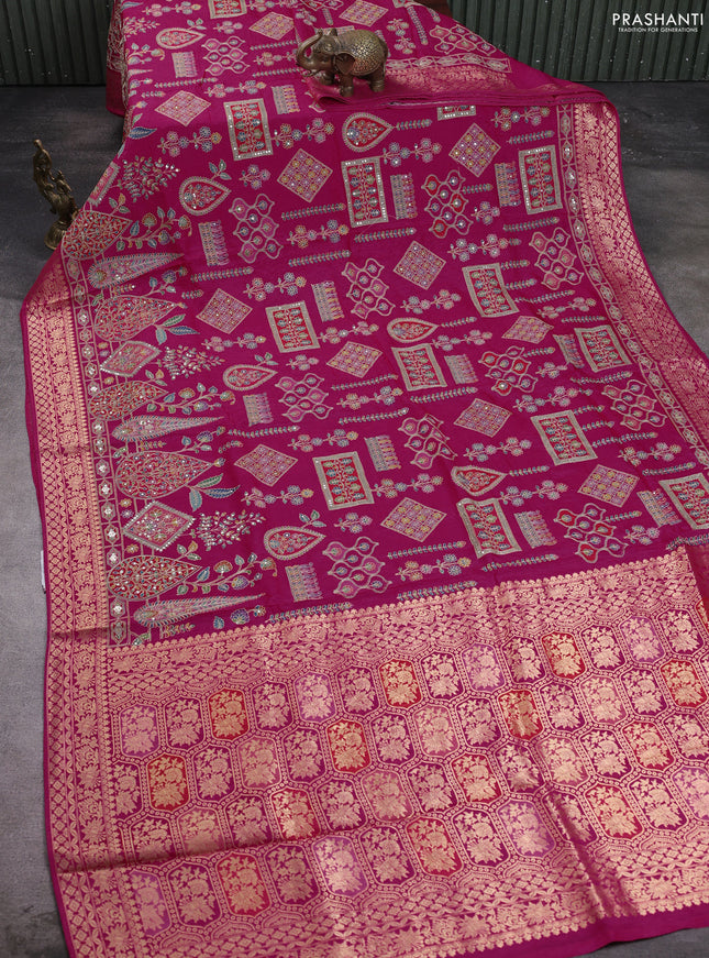 Crepe silk saree pink with allover prints & pita embroidery work and zari woven border