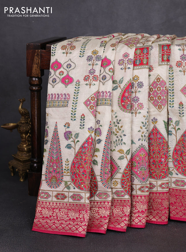 Crepe silk saree beige and pink with allover prints & pita embroidery work and zari woven border