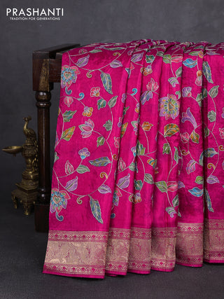 Crepe silk saree pink with allover prints & pita embroidery work and zari woven border