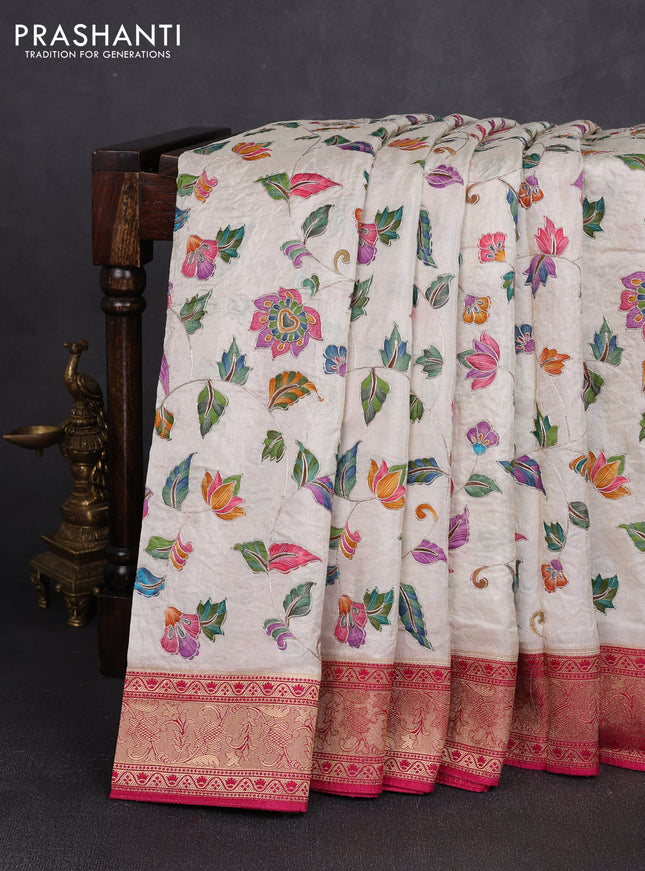 Crepe silk saree cream and pink with allover prints & pita embroidery work and zari woven border