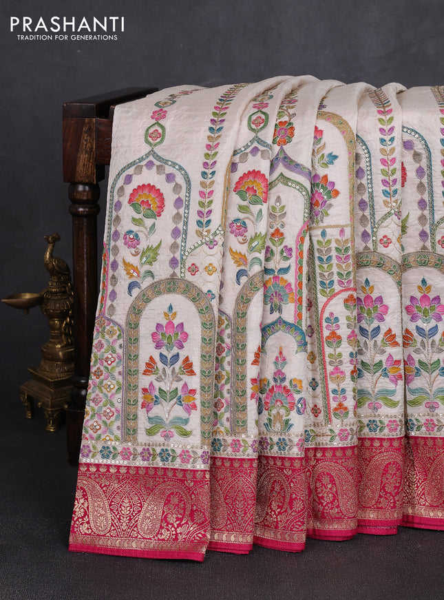 Crepe silk saree cream and pink with allover prints & pita embroidery work and zari woven border